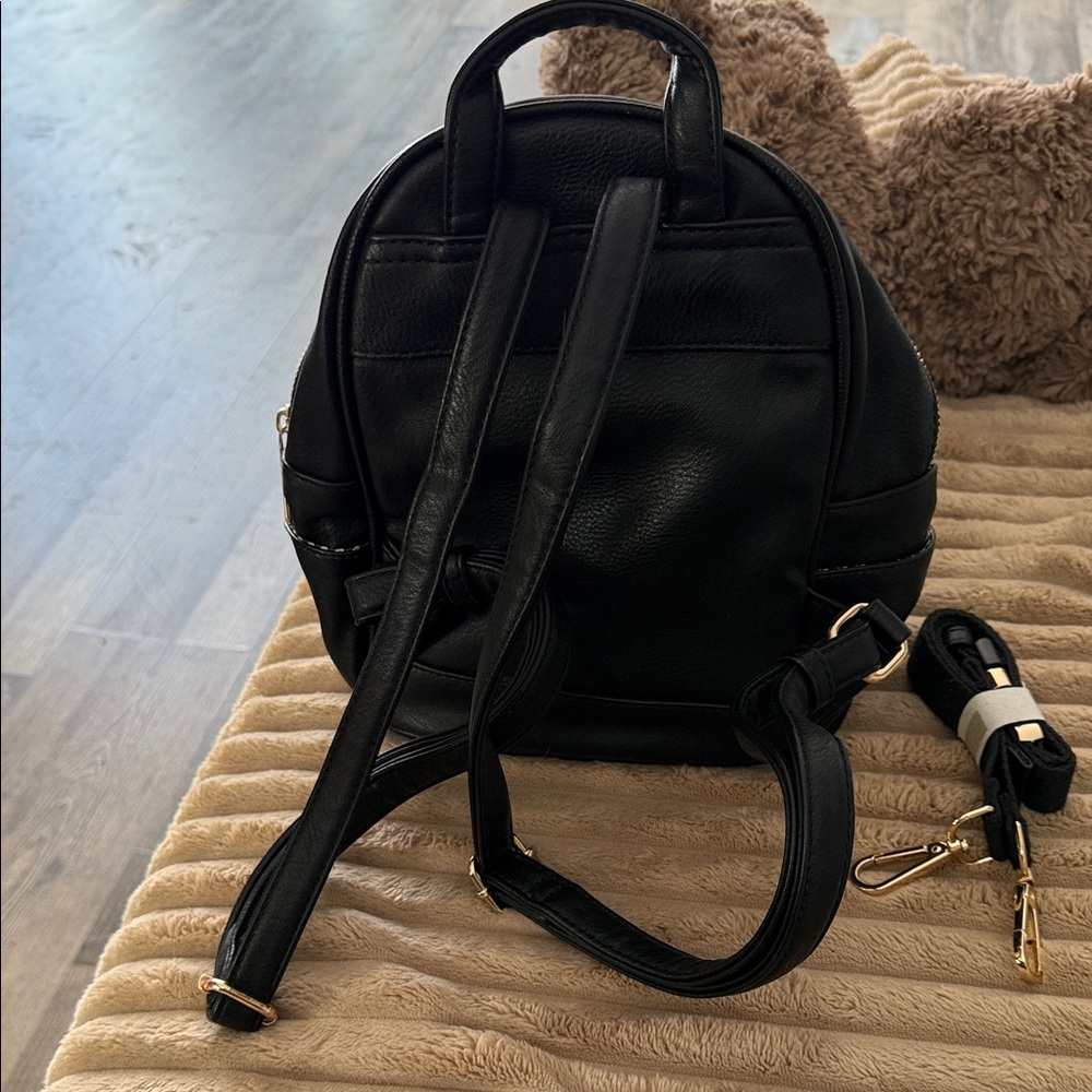 Chic Black Backpack With Gold Hardware - image 2